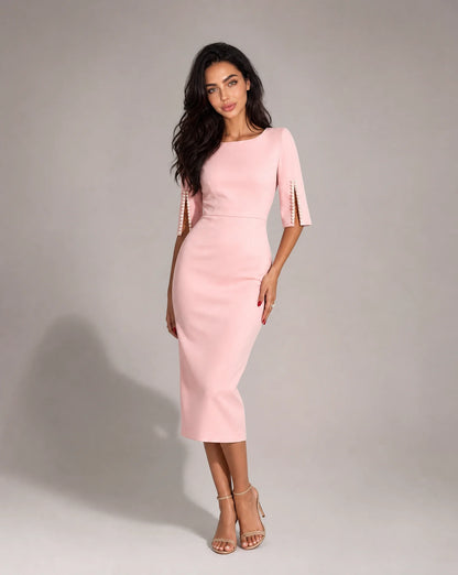 Women's pink pearl sleeve midi dress with feminine tailored fit and elegant event styling by ILYNORA
