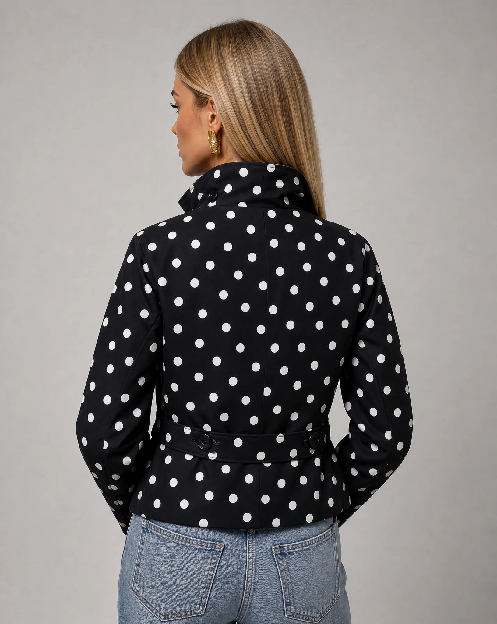 Women's black and white polka dot belted jacket with elegant fit and timeless vintage charm by ILYNORA