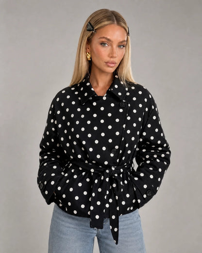 Women's black and white polka dot double breasted jacket with waist belt and vintage-inspired style by ILYNORA
