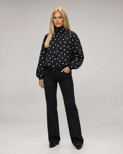Women's black polka dot bomber jacket with oversized silhouette and modern casual look by ILYNORA