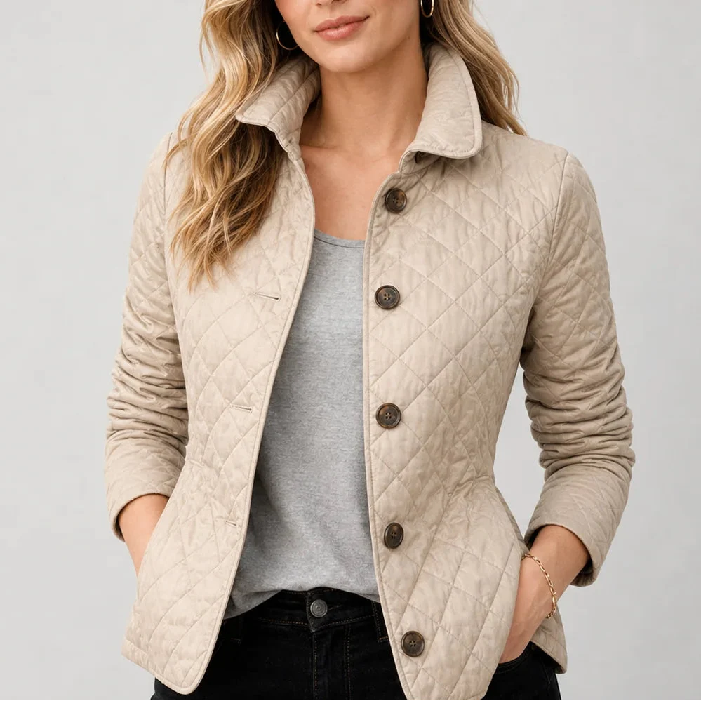 Women's quilted button up jacket with stand collar front view