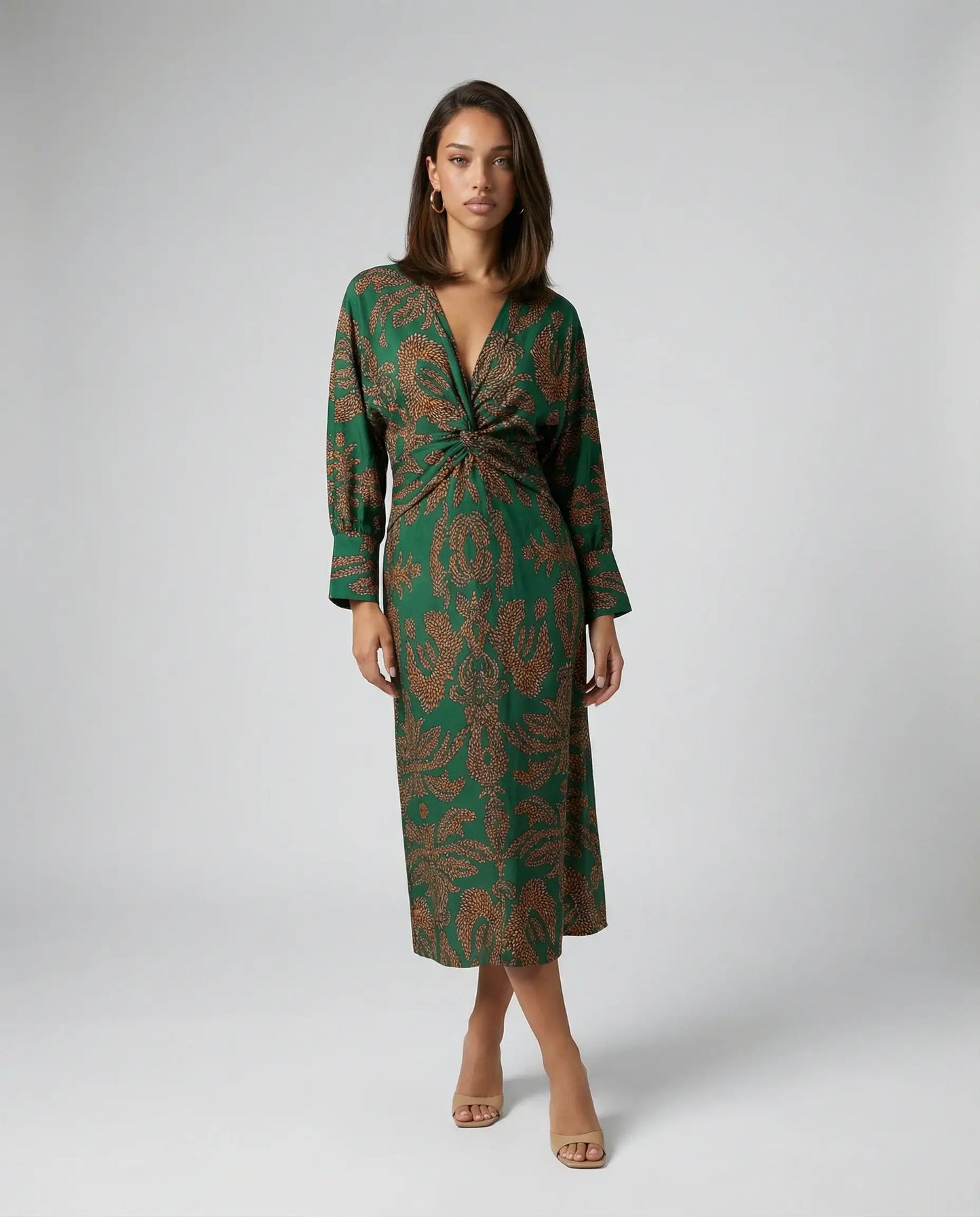 Green satin knot midi dress by Ilynora, front view with flowing fit and subtle waist detail