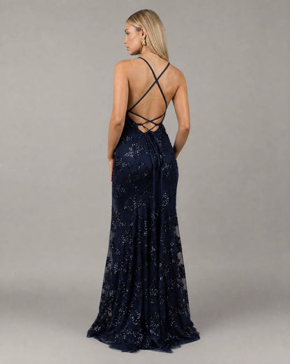 Dark blue sequin evening maxi dress back view with criss cross straps and fitted mermaid shape by ILYNORA