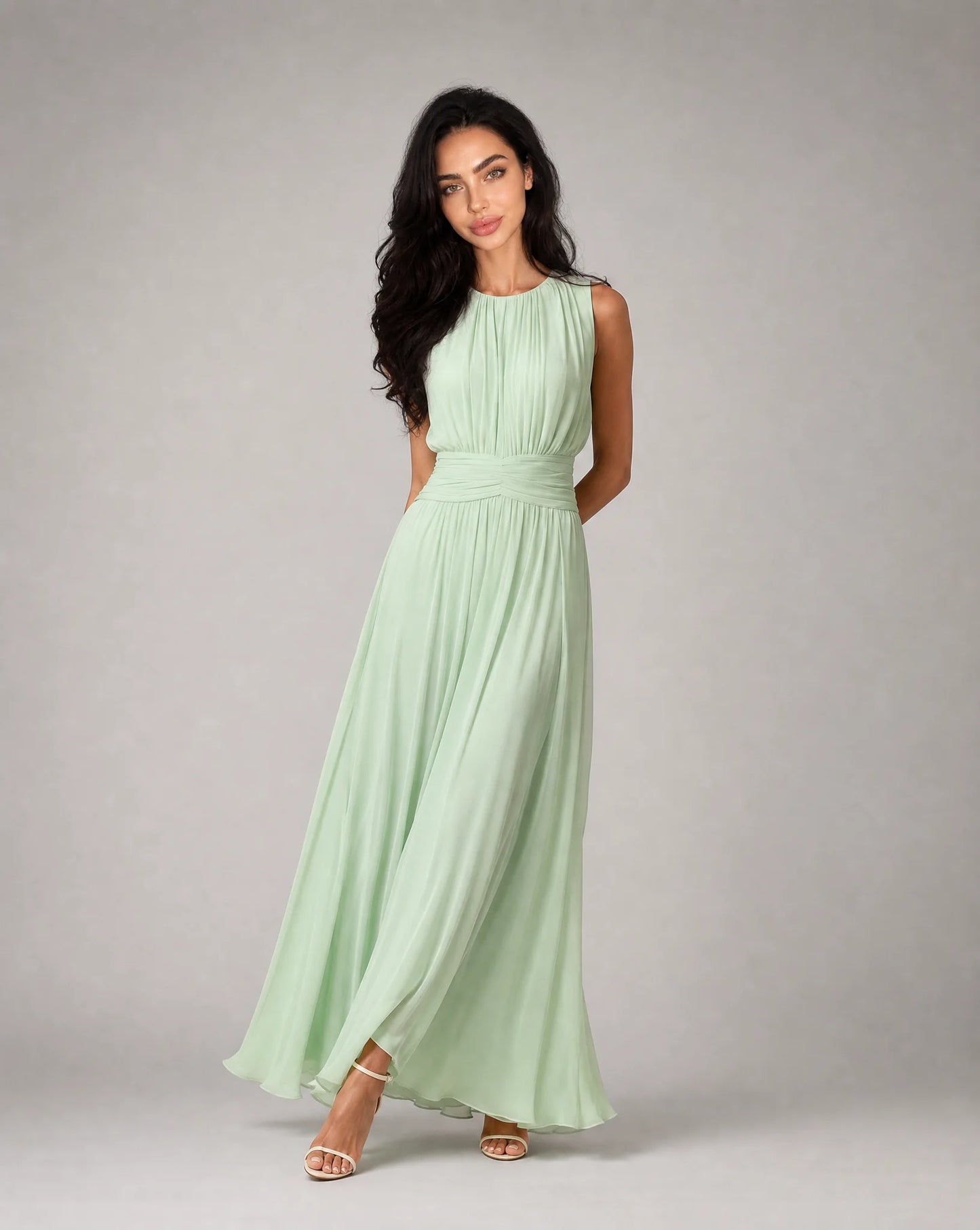 Women's light green sleeveless chiffon maxi dress with graceful drape and flattering fit by ILYNORA