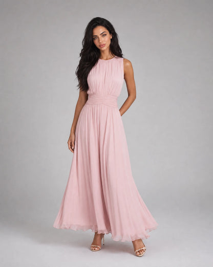 Women's light pink sleeveless chiffon maxi dress with airy fabric and feminine movement by ILYNORA