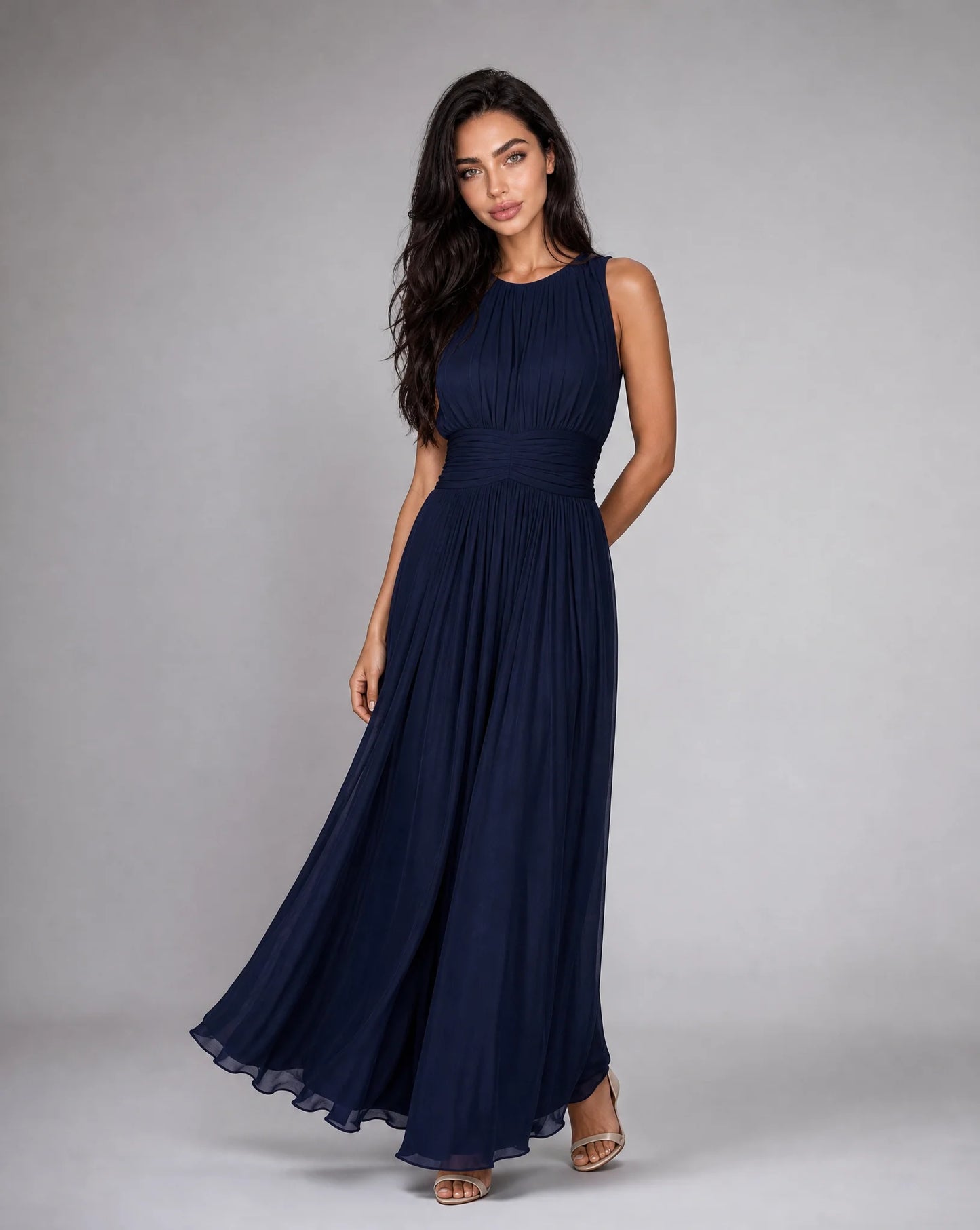 Women's navy blue sleeveless chiffon maxi dress with lightweight elegance and timeless silhouette by ILYNORA
