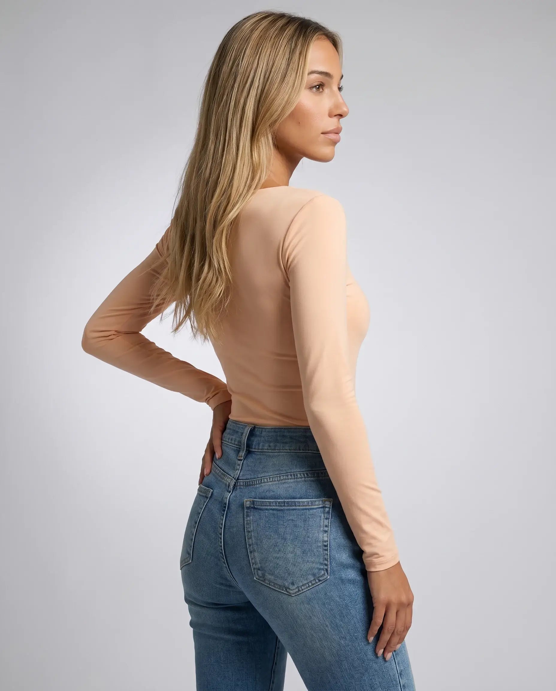 Beige square neck bodysuit for women by Ilynora, back view showcasing the fitted silhouette and long sleeves