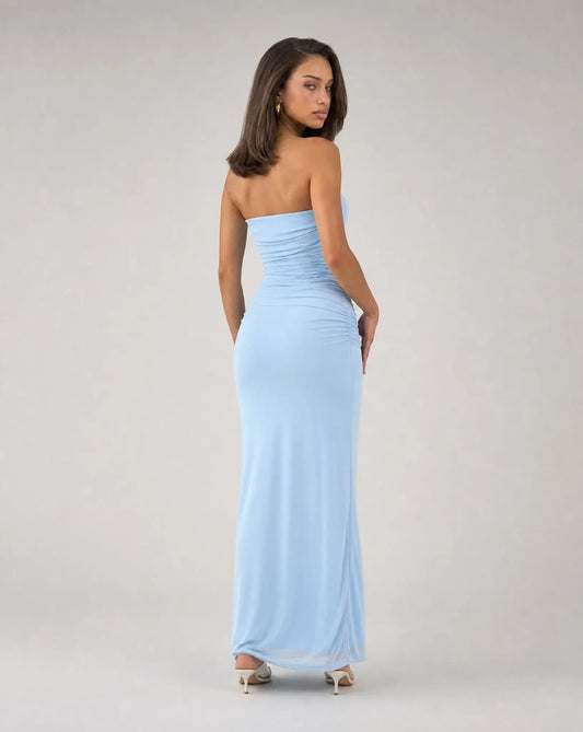Light blue strapless twist front maxi dress for women by Ilynora, full length view highlighting the sleek fit