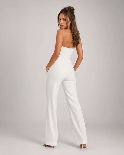 White strapless wide leg jumpsuit side view with elegant tailored fit and flowing wide leg trousers by ILYNORA
