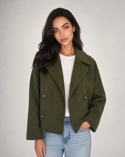 Green structured cropped blazer with tailored silhouette and modern smart casual look by ILYNORA