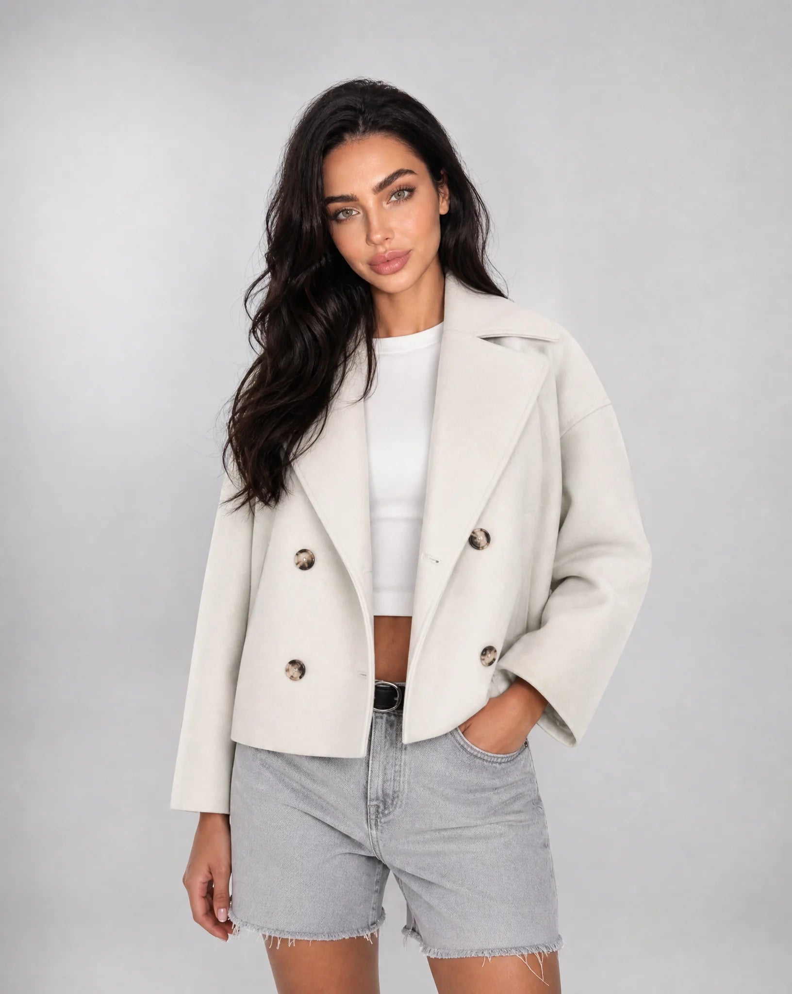 White structured cropped blazer with tailored fit and elegant smart casual styling by ILYNORA