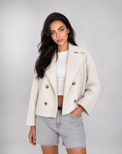 White structured cropped blazer with tailored fit and elegant smart casual styling by ILYNORA