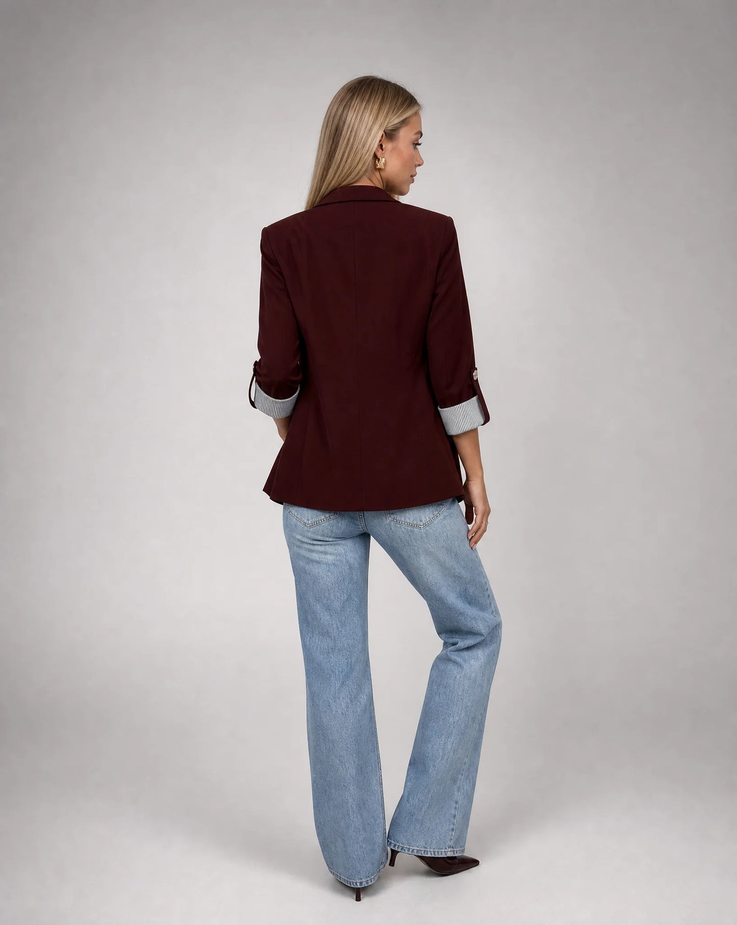 Women's burgundy blazer with modern longline silhouette and sophisticated styling by ILYNORA