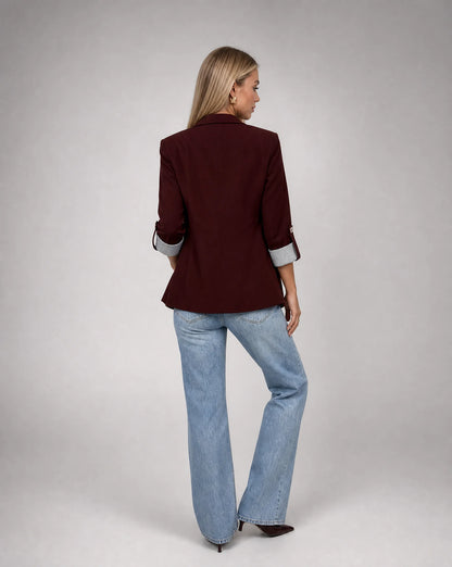 Women's burgundy blazer with modern longline silhouette and sophisticated styling by ILYNORA