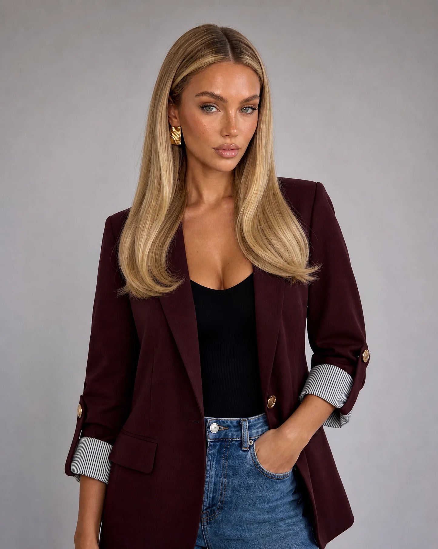 Women's burgundy tailored longline blazer with structured fit and elegant detailing by ILYNORA