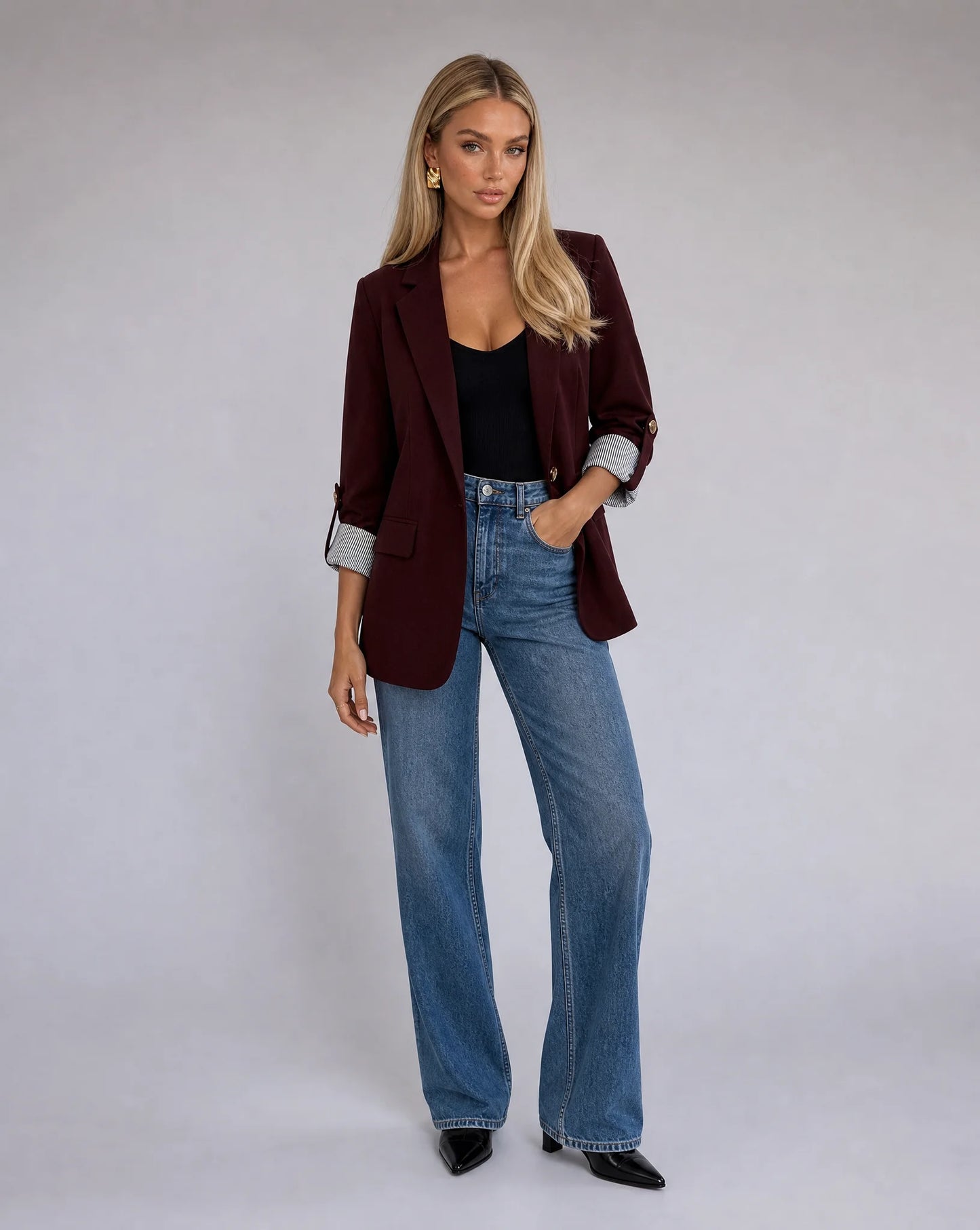 Women's burgundy tailored blazer styled with denim for elevated everyday fashion by ILYNORA
