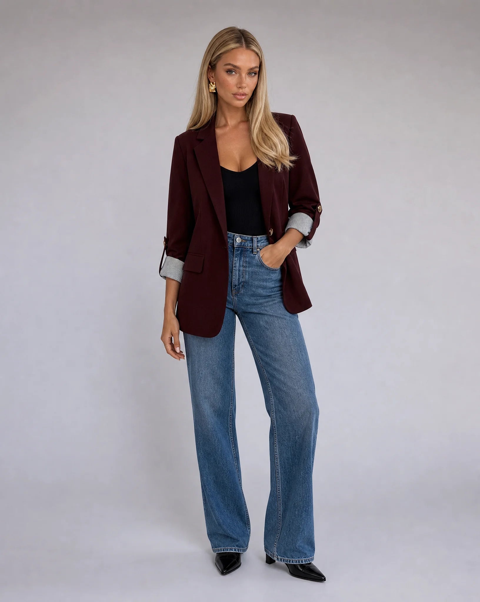 Women's burgundy tailored blazer styled with denim for elevated everyday fashion by ILYNORA