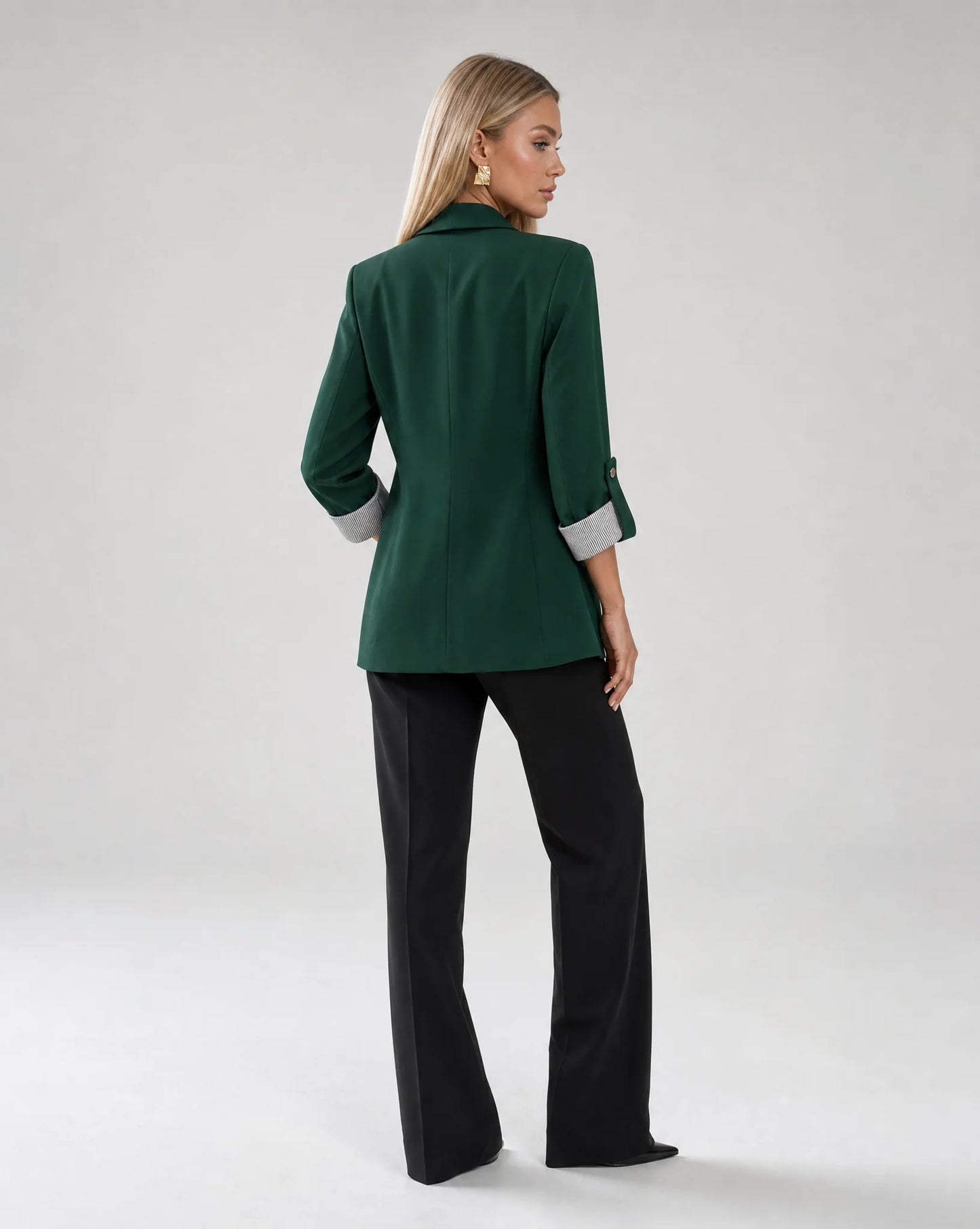Women's dark green longline blazer with rolled sleeves and modern smart casual look by ILYNORA