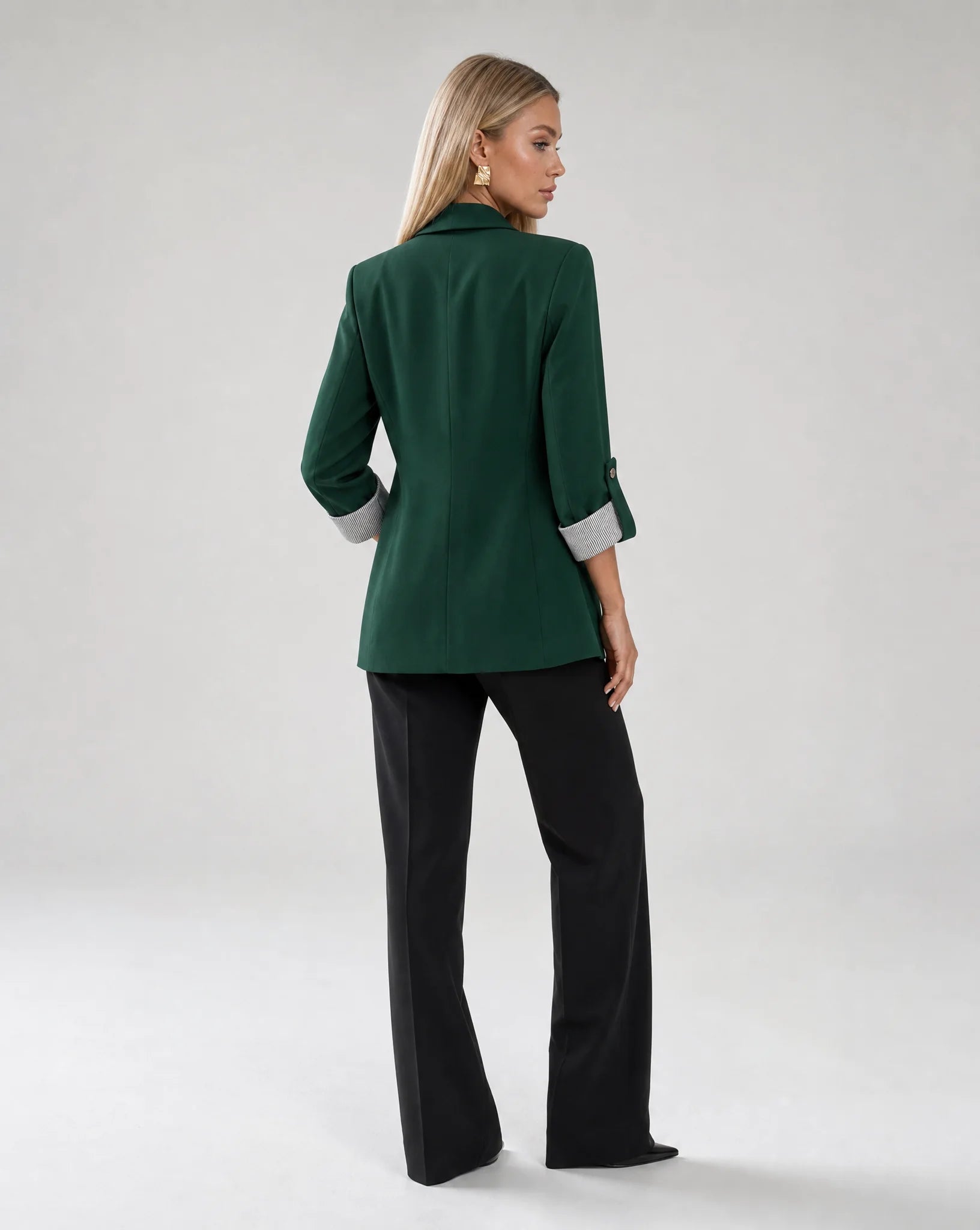 Women's dark green longline blazer with rolled sleeves and modern smart casual look by ILYNORA