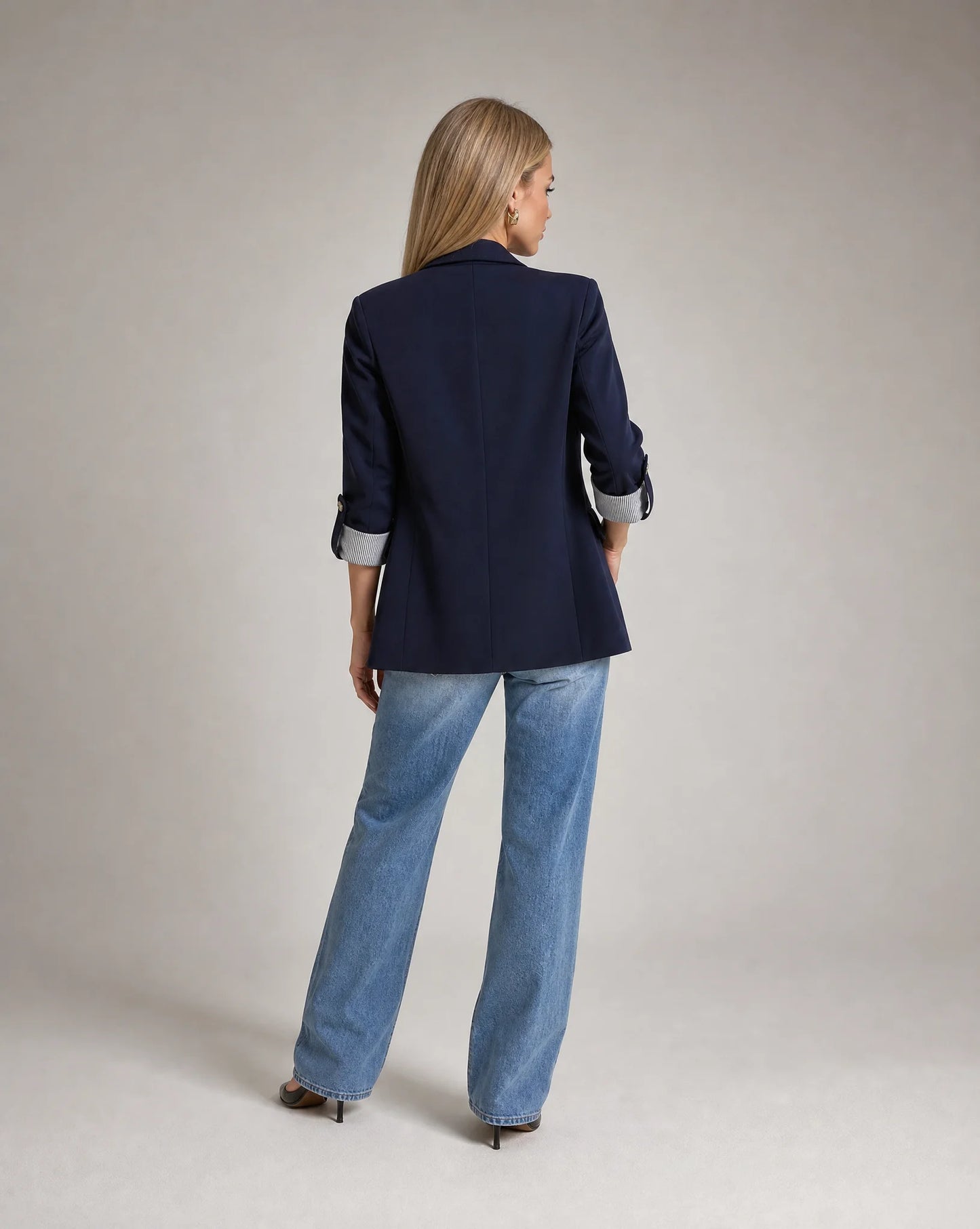 Women's navy blue blazer with relaxed tailored fit and versatile wardrobe appeal by ILYNORA