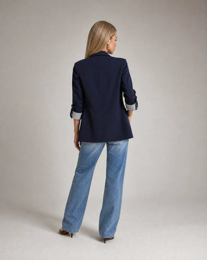 Women's navy blue blazer with relaxed tailored fit and versatile wardrobe appeal by ILYNORA
