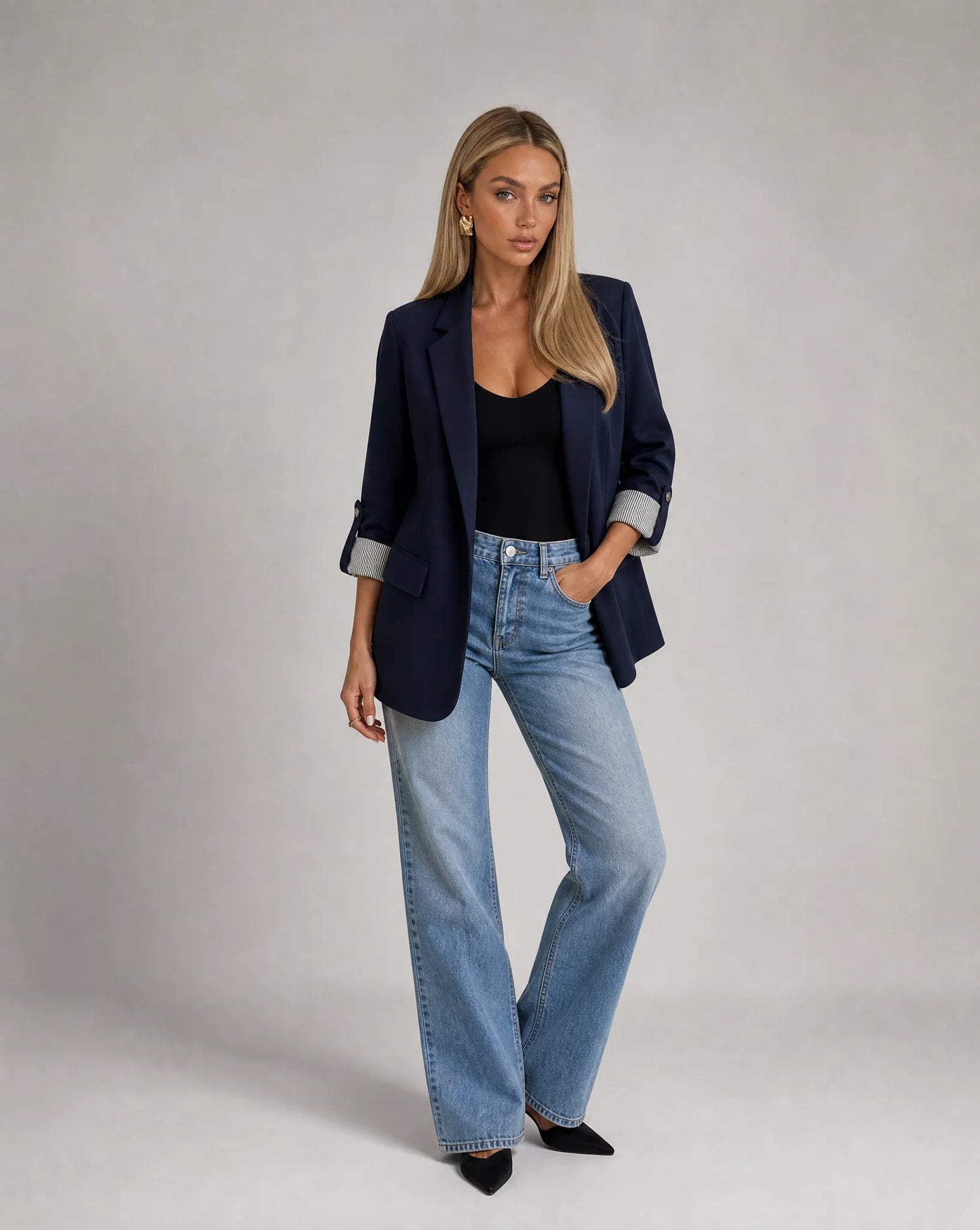 Women's navy blue longline blazer styled with denim for effortless smart casual wear by ILYNORA