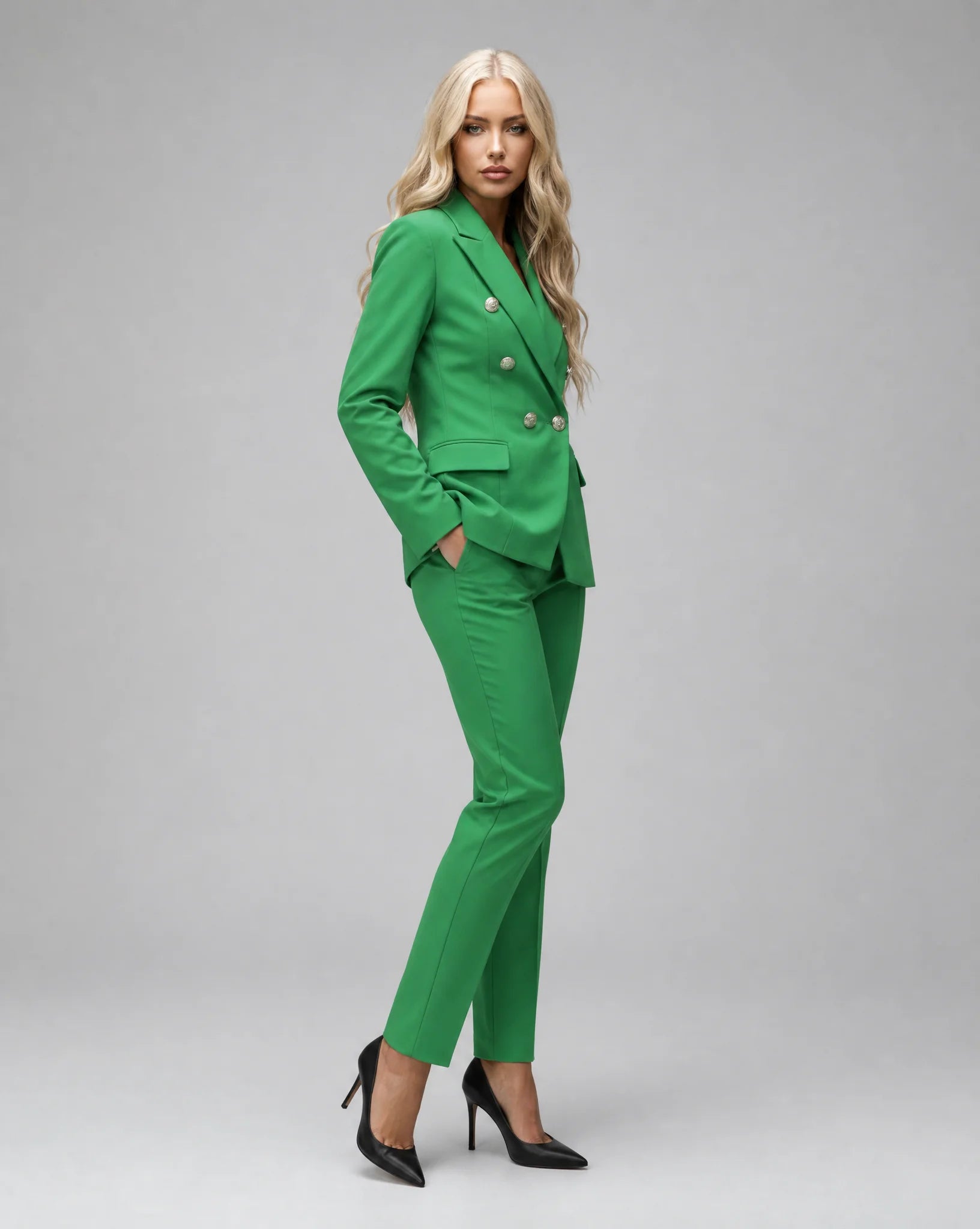 Green tailored pantsuit side view with double breasted blazer and modern silhouette by ILYNORA