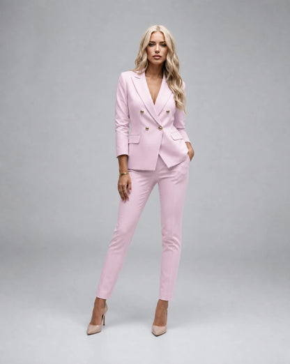 Pink tailored two piece pantsuit with double breasted blazer and feminine formal styling by ILYNORA