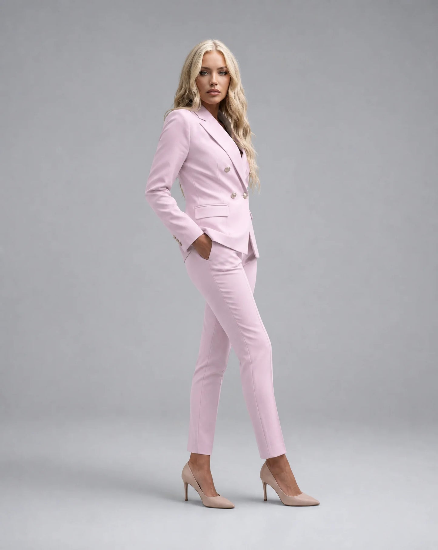 Pink tailored pantsuit side view with fitted silhouette and elegant occasion wear by ILYNORA