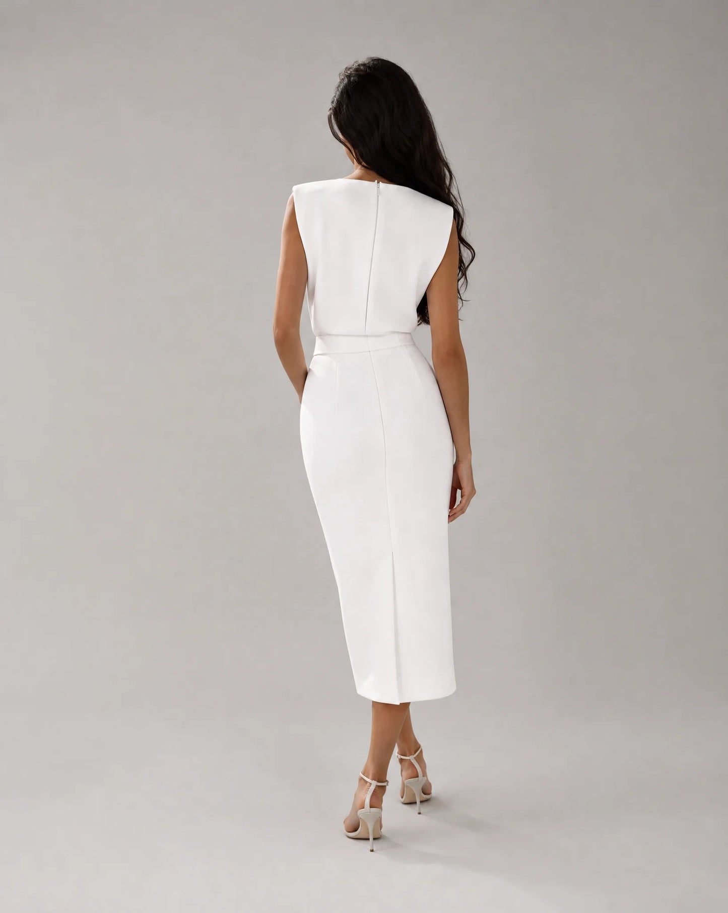 Women's white pencil midi dress viewed from the back with tailored fit by ILYNORA