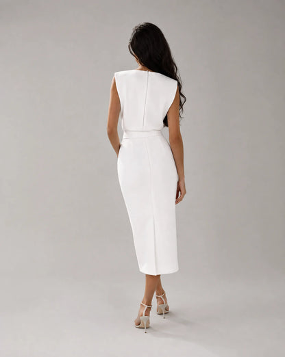 Women's white pencil midi dress viewed from the back with tailored fit by ILYNORA