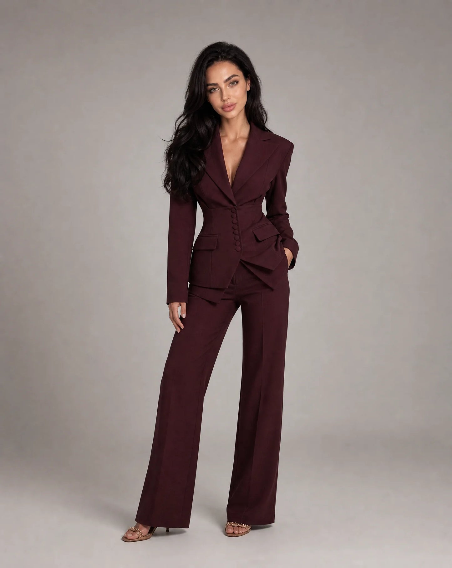Wine red tailored two piece wide leg suit with fitted blazer and elegant formal styling by ILYNORA
