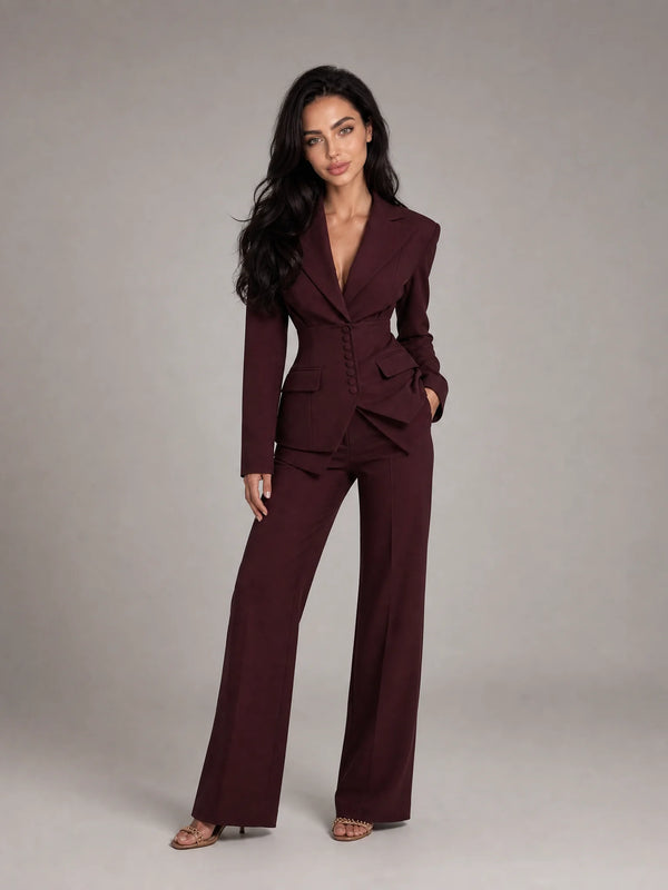 Wine red tailored two piece wide leg suit with fitted blazer and elegant formal styling by ILYNORA