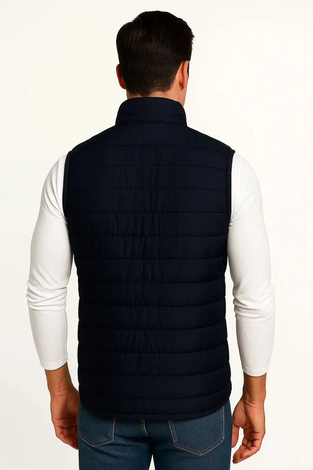 Back view of men's navy blue lightweight quilted puffer vest with quilted insulation and stand collar by ILYNORA