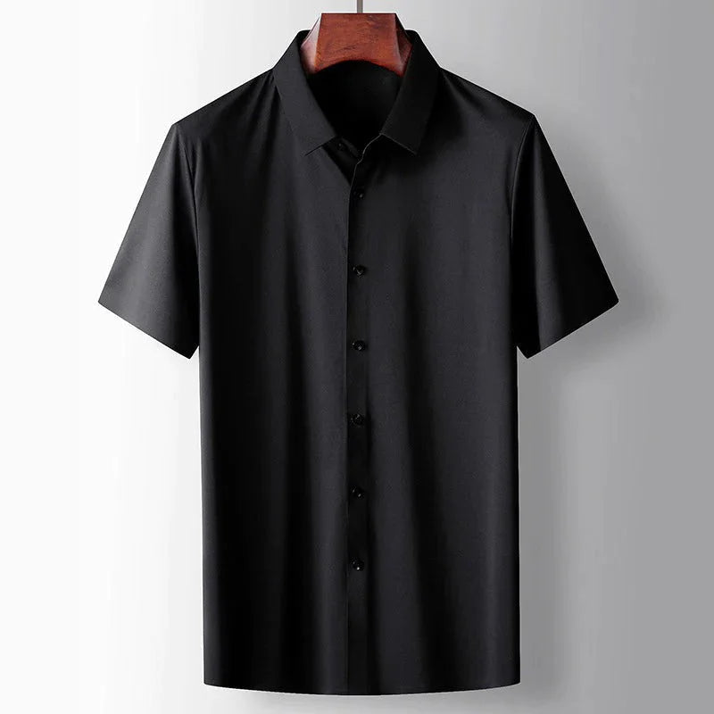 Men's black lightweight silk blend short sleeve shirt with premium breathable fabric, relaxed fit and timeless smart casual design by ILYNORA
