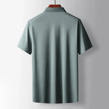 Back view of men's green lightweight silk blend shirt with relaxed fit, smooth drape and breathable short sleeve construction by ILYNORA