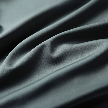 Premium green silk blend fabric showcasing the smooth lightweight texture and luxurious finish of the men's short sleeve shirt by ILYNORA