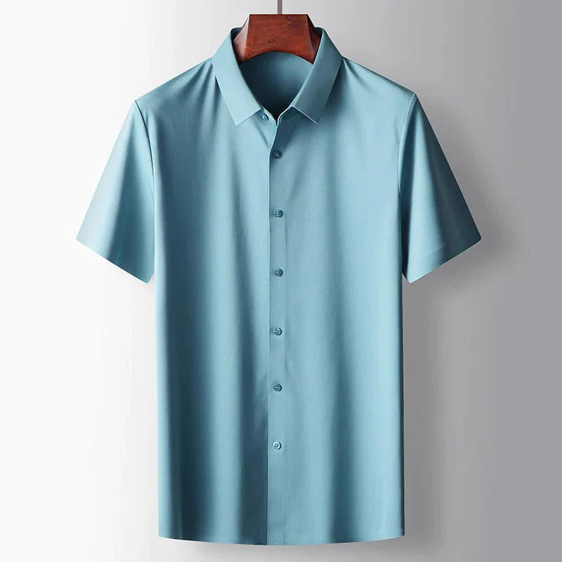 Men's light blue lightweight silk blend short sleeve shirt with relaxed fit, classic collar and premium summer fabric by ILYNORA