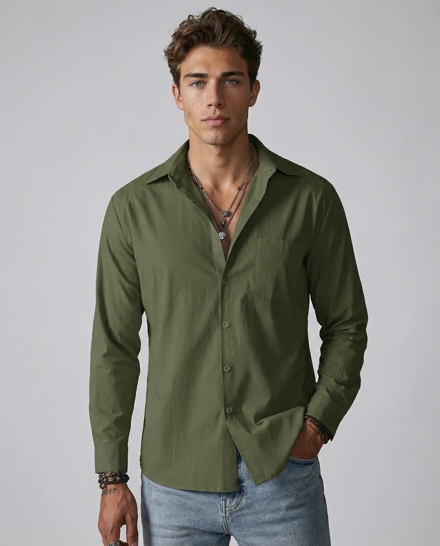 Green linen shirt for men by Ilynora, front view with relaxed fit and classic summer style