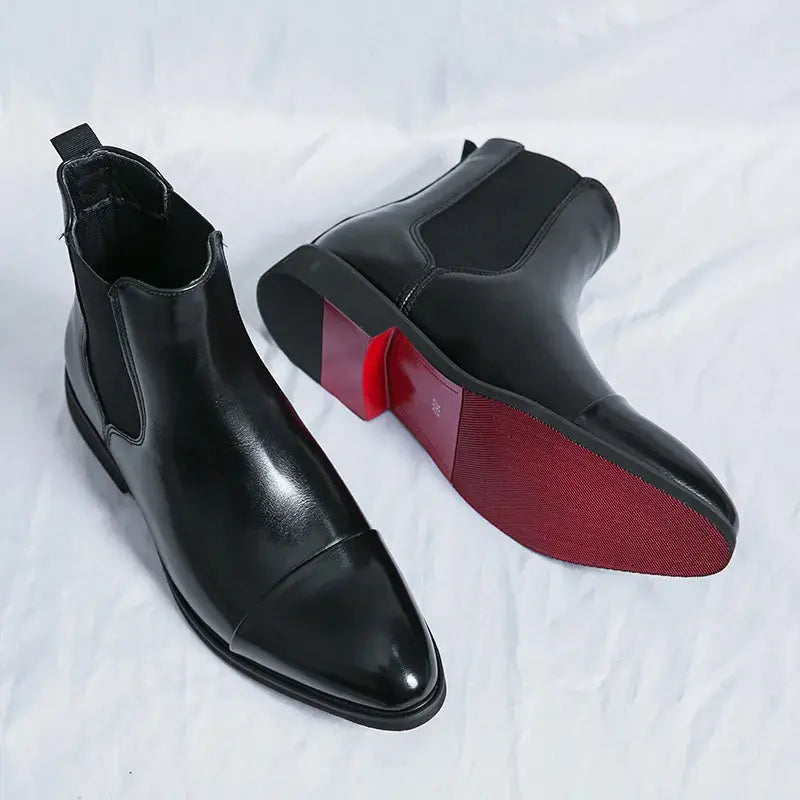 Close-up of men's jet black premium leather Chelsea boots featuring polished leather, elastic gussets and refined craftsmanship by ILYNORA