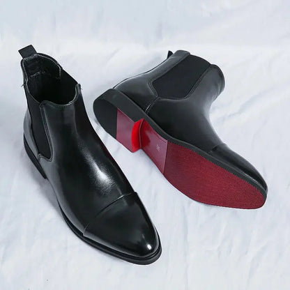 Close-up of men's jet black premium leather Chelsea boots featuring polished leather, elastic gussets and refined craftsmanship by ILYNORA