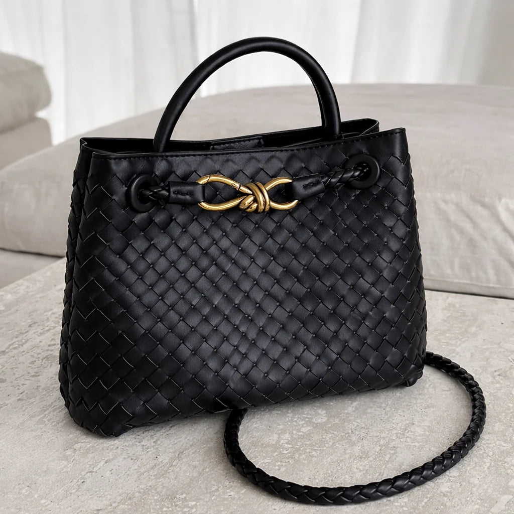 ILYNORA black woven faux leather tote bag with structured handles and elegant gold-tone hardware