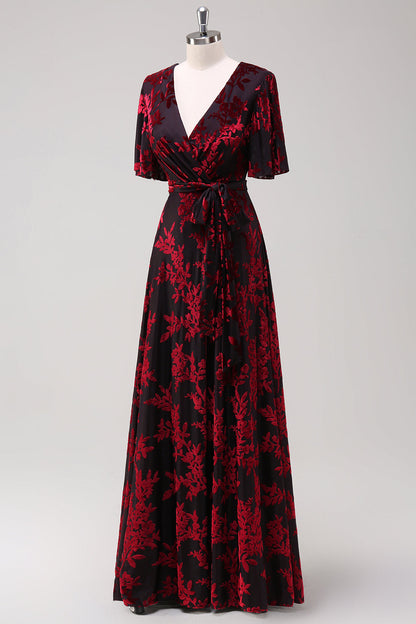 ILYNORA burgundy velvet wrap maxi dress, side view showing flowing A-line skirt