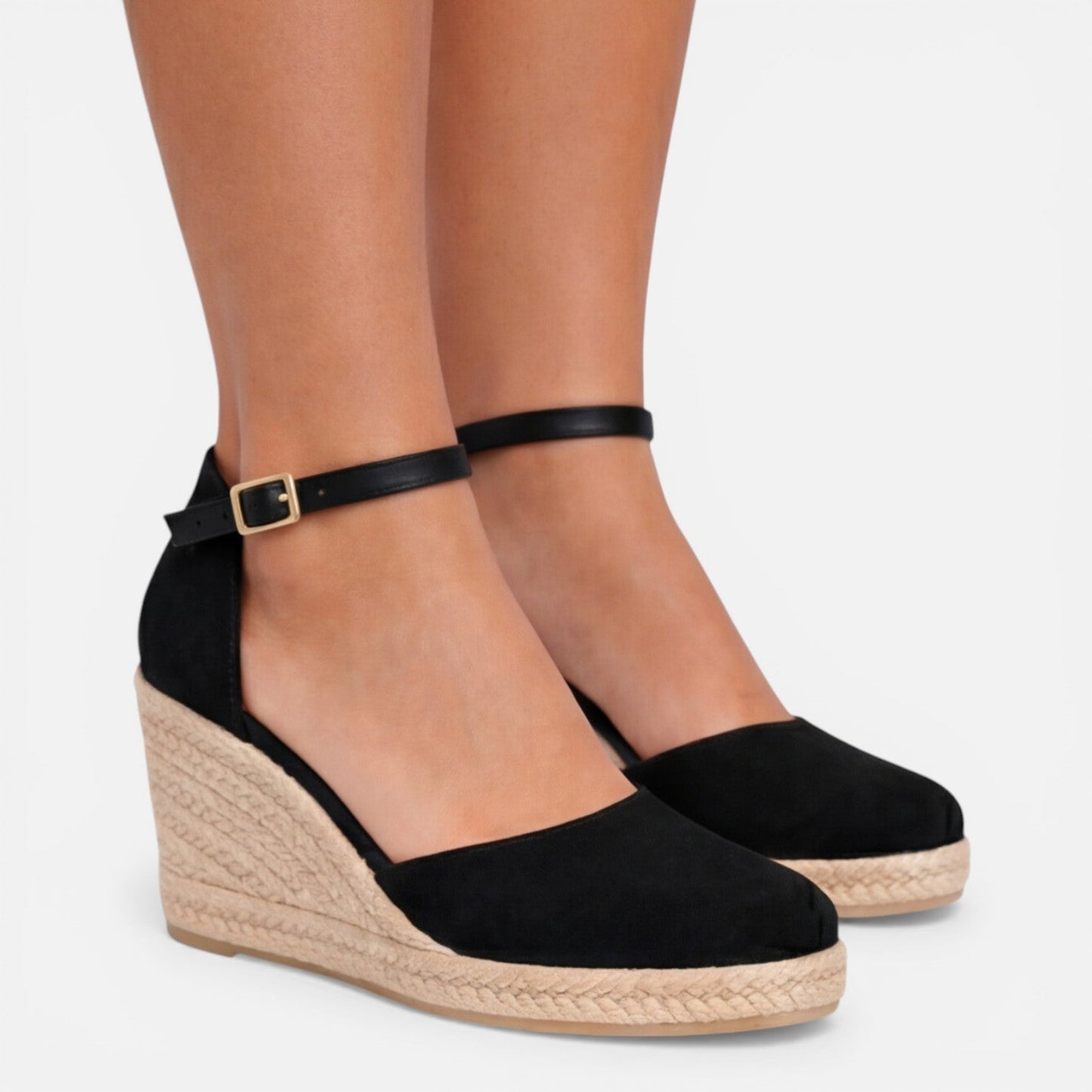 Women's black closed toe espadrille wedges with suede upper, ankle strap and jute platform sole for summer occasions by ILYNORA