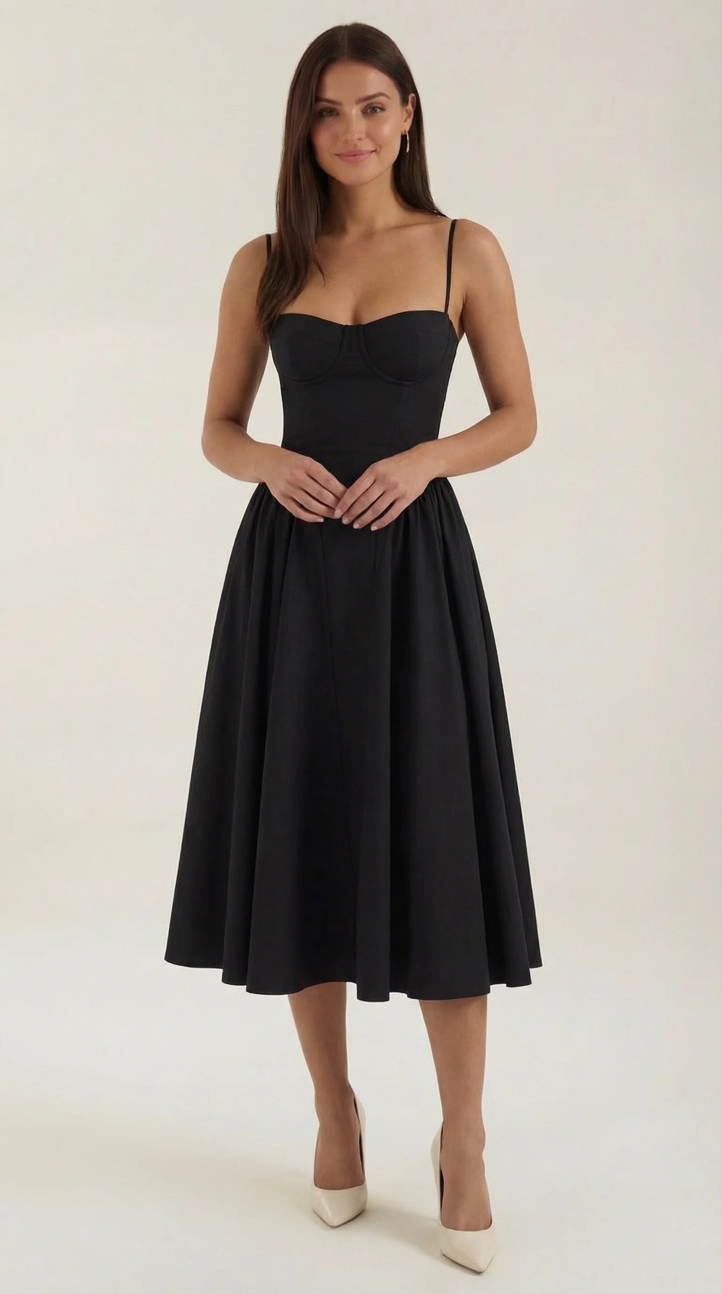 Women's black corset fit and flare midi dress with sweetheart neckline, fitted bodice and elegant full skirt by ILYNORA