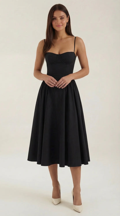 Women's black corset fit and flare midi dress with sweetheart neckline, fitted bodice and elegant full skirt by ILYNORA