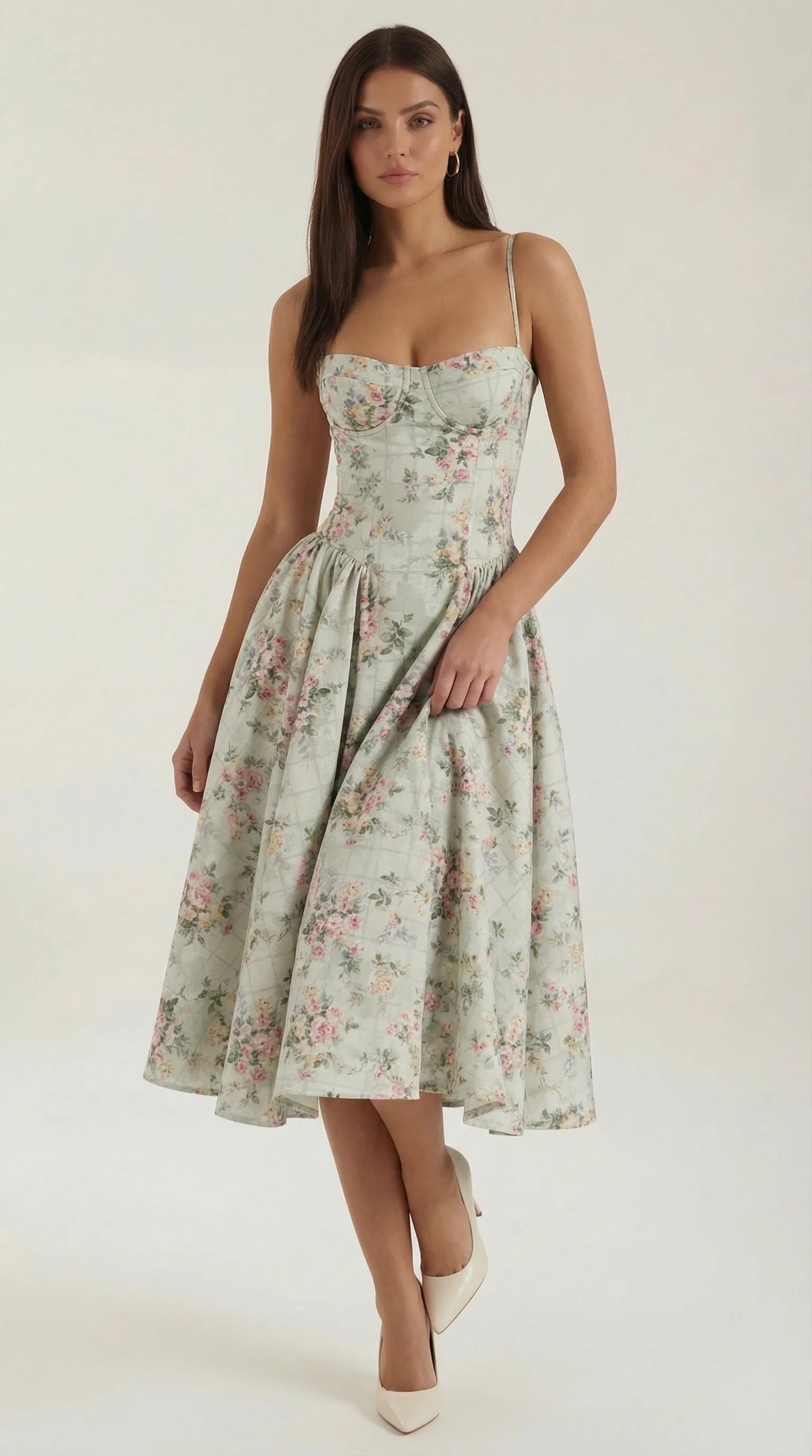 Women's green floral corset fit and flare midi dress with sweetheart neckline, fitted bodice and flowing skirt by ILYNORA