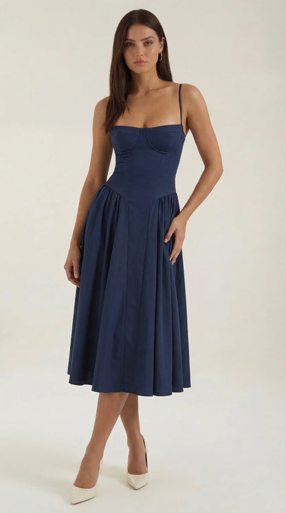 Women's navy corset fit and flare midi dress with sweetheart neckline, fitted bodice and elegant full skirt by ILYNORA