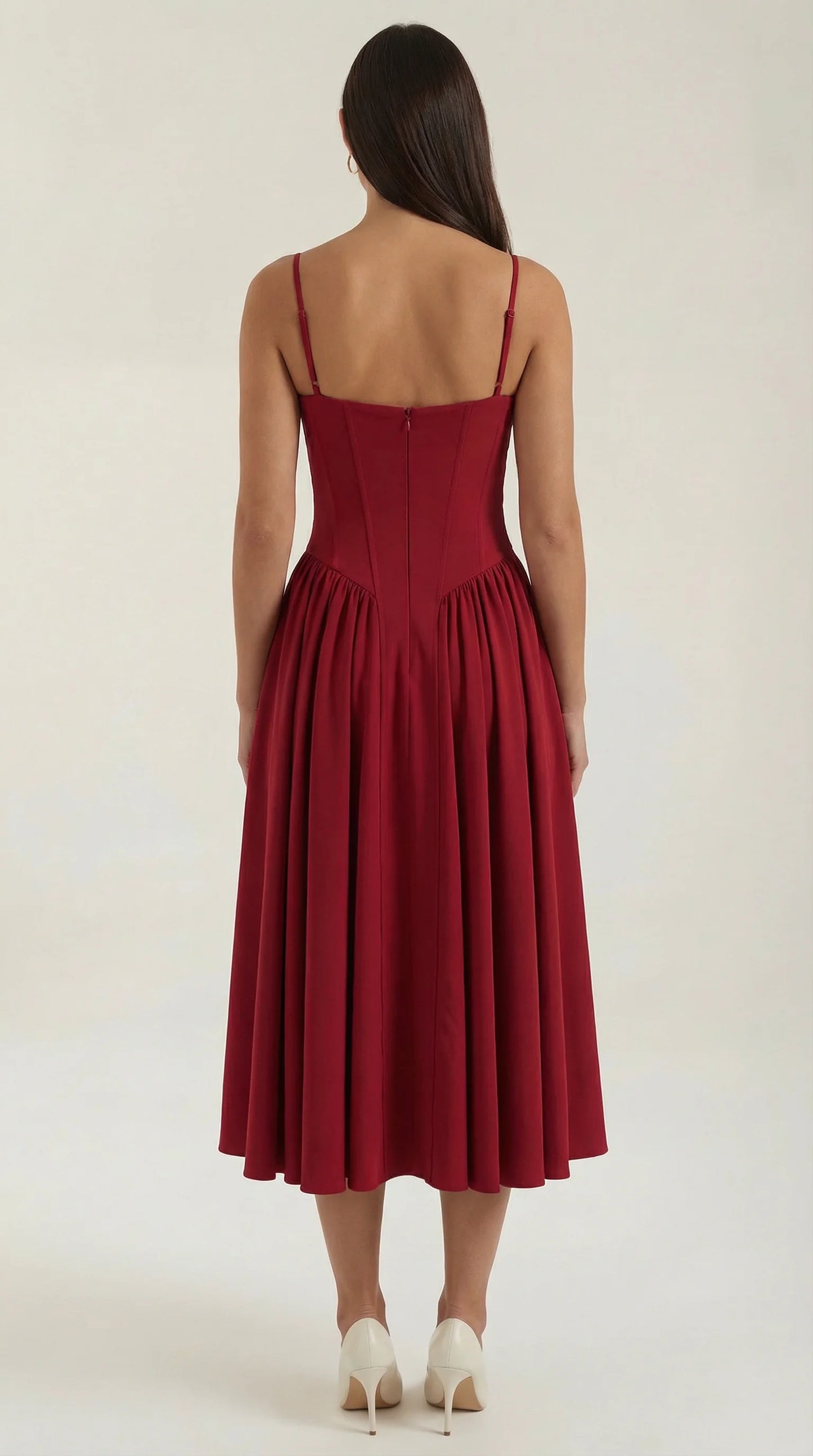 Back view of women's red corset fit and flare midi dress with elegant fitted waist and full midi skirt by ILYNORA