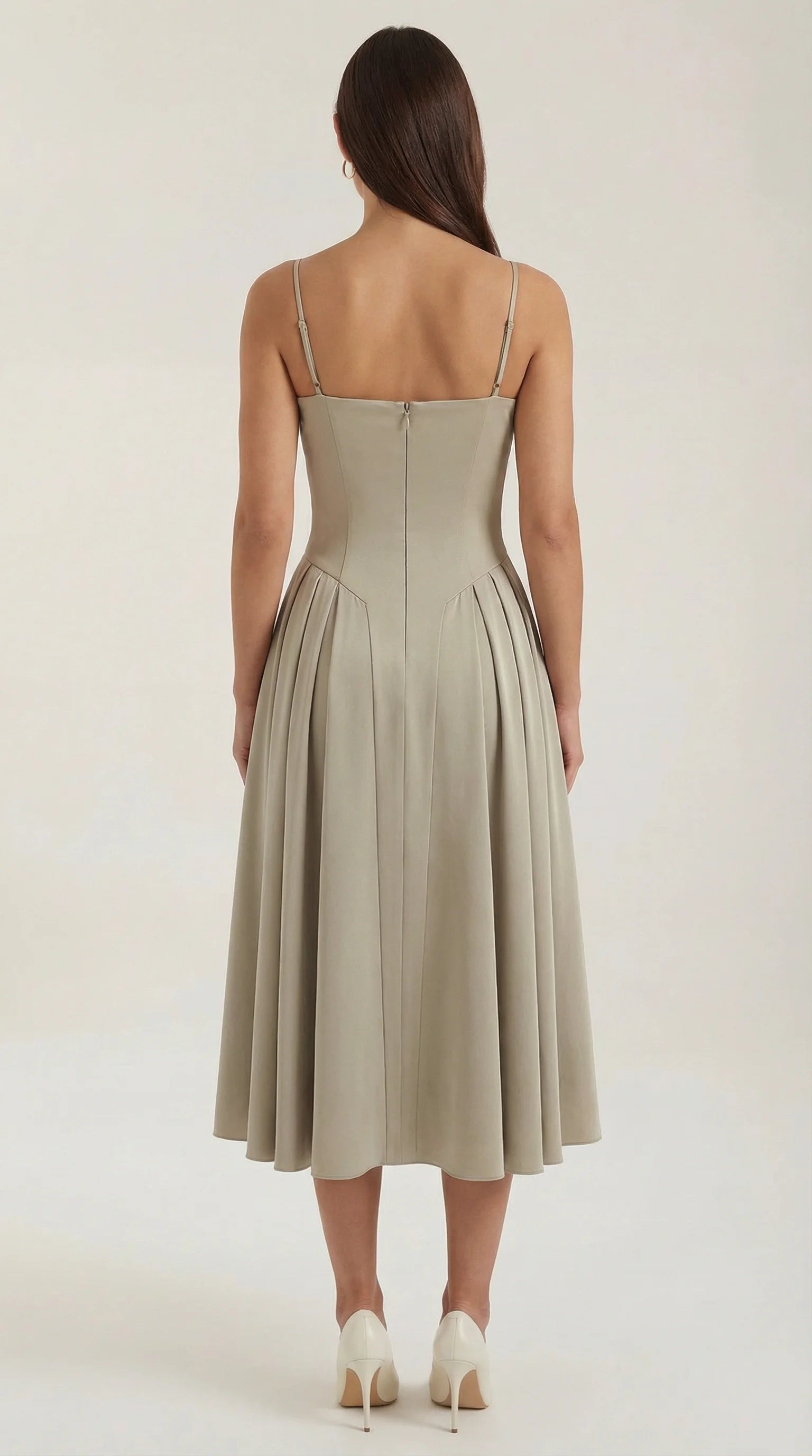 Back view of women's tan corset fit and flare midi dress with elegant fitted waist and graceful midi skirt by ILYNORA